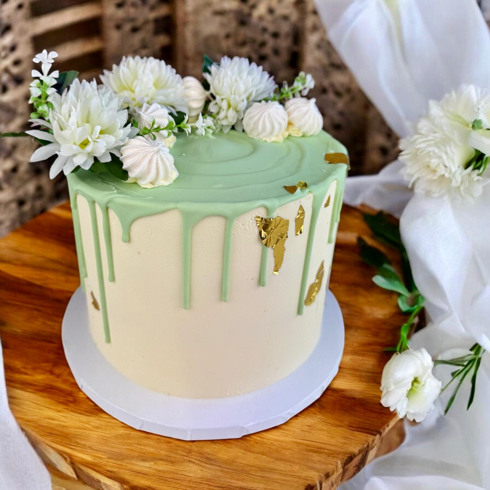 Mint green floral drip cake
