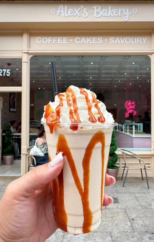 Alex’s Bakery Deansgate shopfront with whipped drink