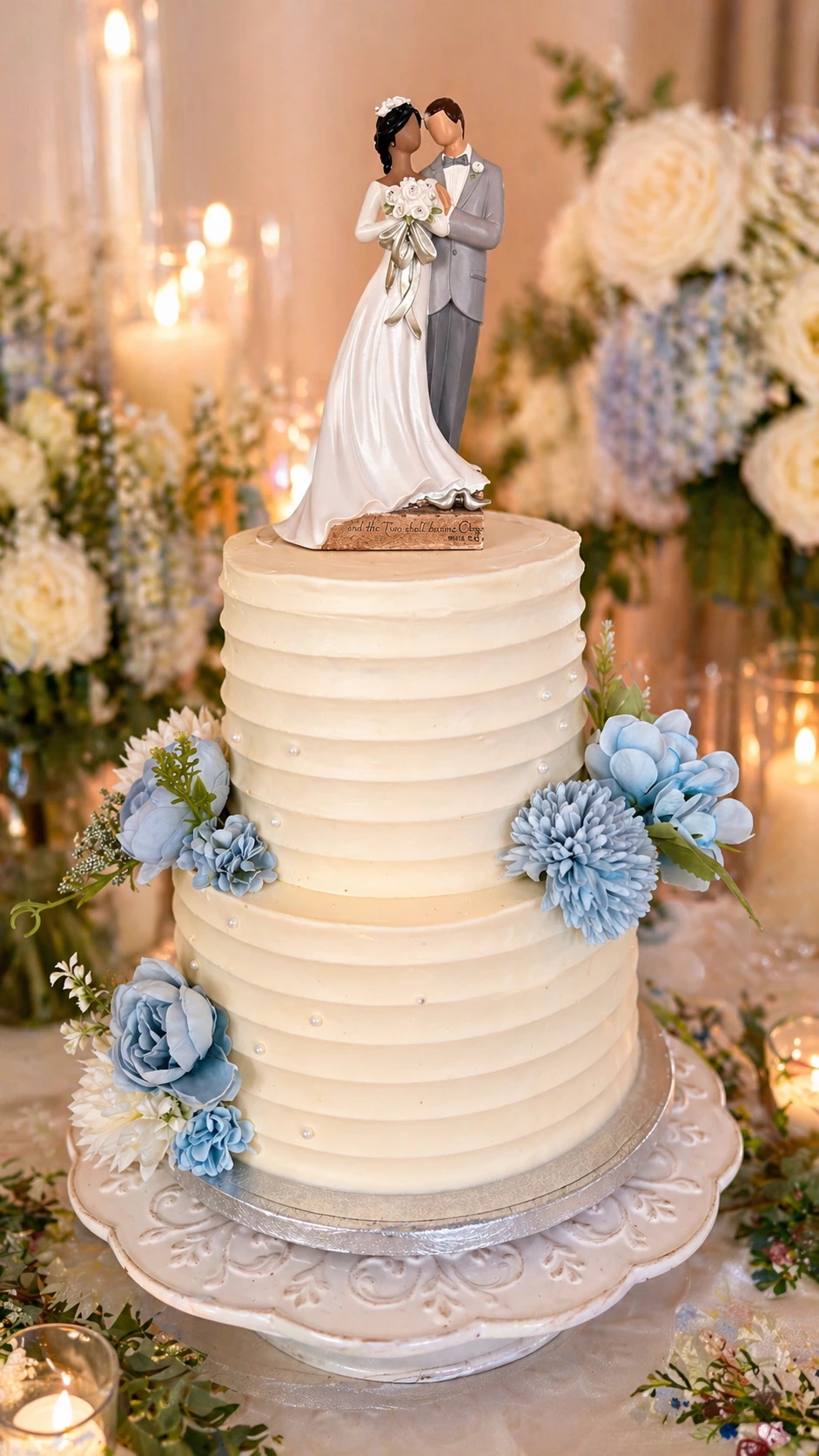 Wedding cake with pale blue flowers