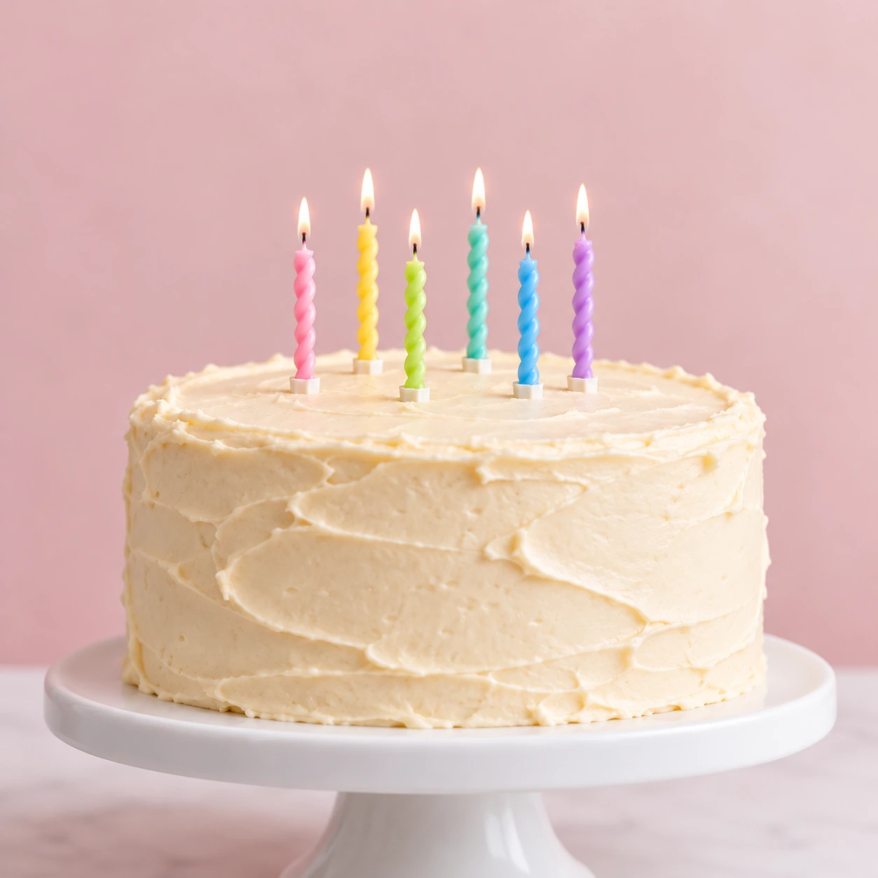 Pastel Rainbow Twist Candles – Box of 6 - six realistically sized candles on a cake
